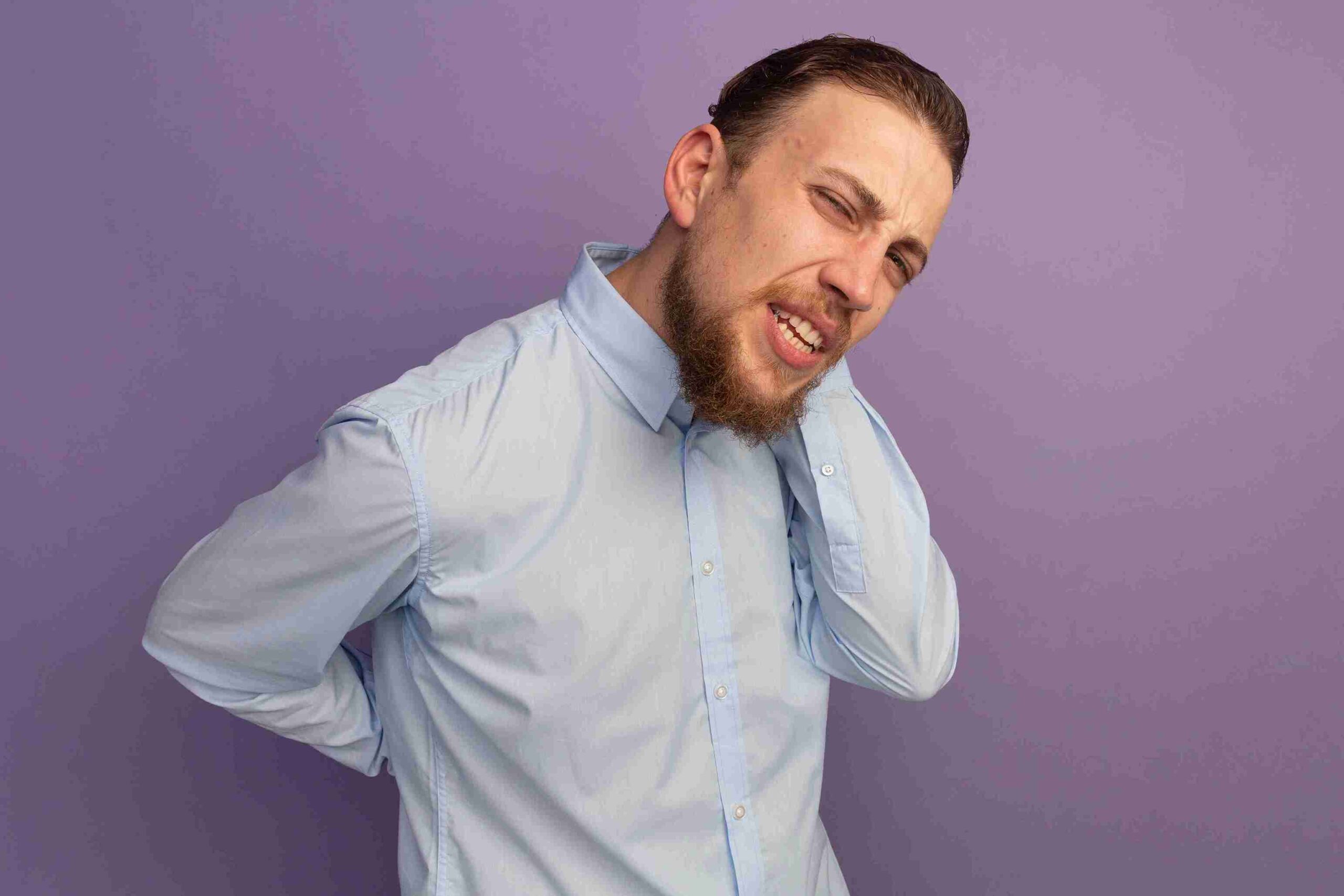 bold young man holding neck sign of High Functioning Depression