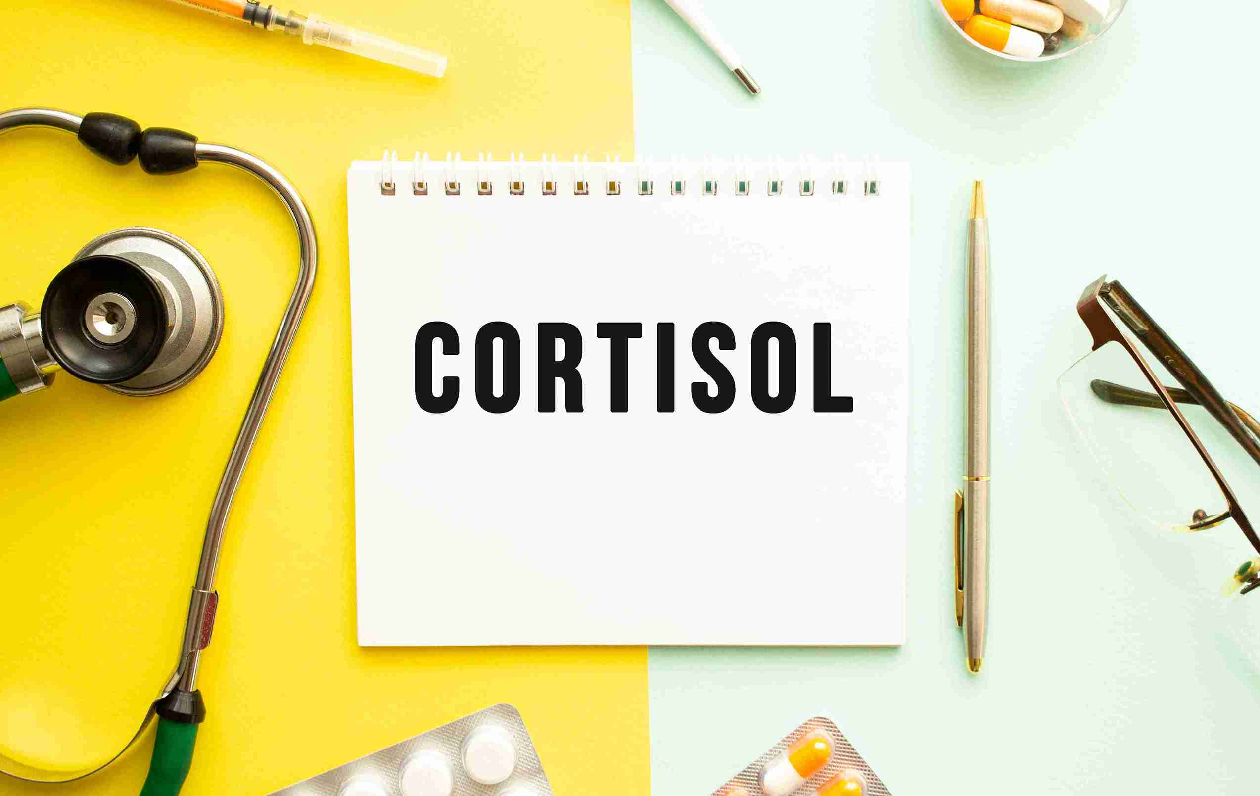 cortisole written on a card with medicines on a table