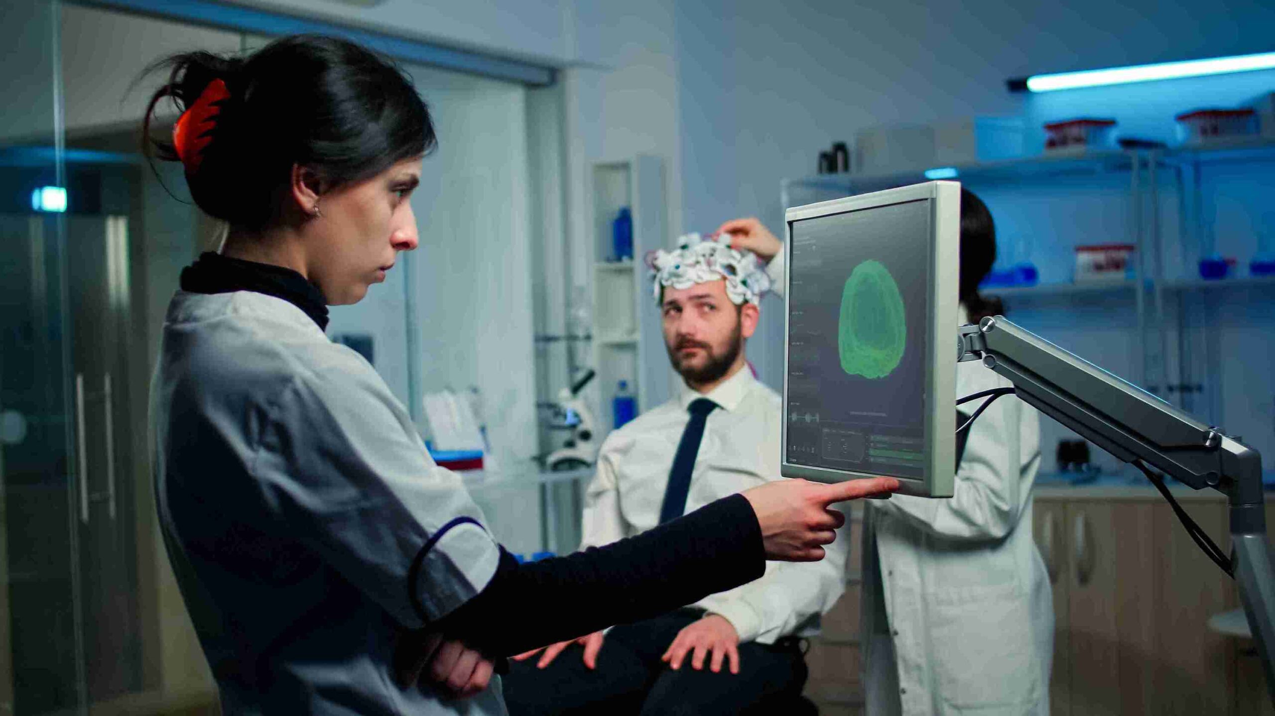 woman researcher looking monitor for depression test